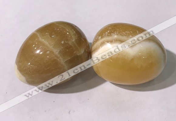 CDN1380 35*45mm egg-shaped yellow calcite decorations wholesale