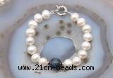 CFB1071 Hand-knotted 9mm - 10mm potato white freshwater pearl & blue tiger eye bracelet