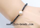CFB833 4mm faceted round black onyx & potato white freshwater pearl bracelet