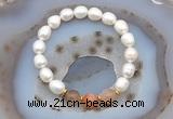 CFB913 9mm - 10mm rice white freshwater pearl & rainbow moonstone stretchy bracelet