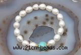 CFB926 9mm - 10mm rice white freshwater pearl & blue sea sediment jasper stretchy bracelet
