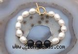 CFB975 Hand-knotted 9mm - 10mm rice white freshwater pearl & black agate bracelet