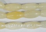 CFG552 15.5 inches 8*20mm carved rice yellow aventurine beads