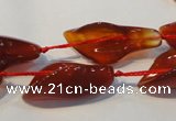 CFG563 15.5 inches 14*28mm carved trumpet flower red agate beads