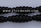 CFG760 15.5 inches 10*30mm carved rice black agate beads