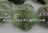 CFG922 15.5 inches 32*33mm carved flower green rutilated quartz beads