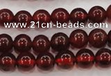 CGA601 15.5 inches 6mm A grade round natural orange garnet beads