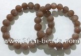 CGB4061 7.5 inches 10mm round sunstone beaded bracelets