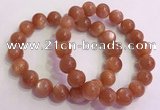 CGB4541 7.5 inches 12mm - 13mm round golden sunstone beaded bracelets