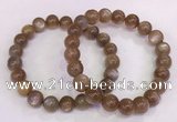 CGB4549 7.5 inches 9mm - 10mm round sunstone beaded bracelets