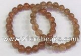 CGB4613 8mm - 9mm round golden rutilated quartz beaded bracelets