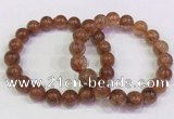 CGB4621 10mm - 11mm round golden rutilated quartz beaded bracelets