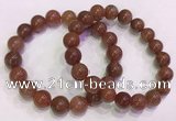 CGB4627 10mm - 11mm round red rutilated quartz beaded bracelets