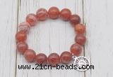 CGB6864 10mm, 12mm fire agate beaded bracelet with alloy pendant