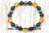CGB8411 8mm synthetic amber, black onyx & hematite energy bracelet