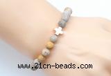 CGB9434 8mm, 10mm matte fossil coral & cross hematite power beads bracelets