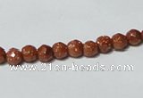 CGS57 15.5 inches 6mm faceted round goldstone beads wholesale