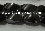 CHE161 15.5 inches 6*12mm twisted rice hematite beads