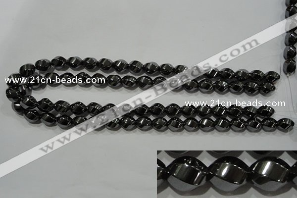 CHE166 15.5 inches 10*12mm twisted rice hematite beads