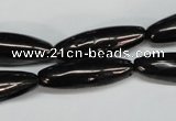 CJB54 15.5 inches 10*30mm rice natural jet gemstone beads