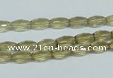 CLQ10 15.5 inches 6*10mm faceted rice natural lemon quartz beads