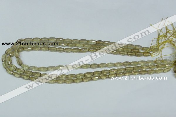 CLQ10 15.5 inches 6*10mm faceted rice natural lemon quartz beads