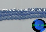 CLU131 15.5 inches 10mm flat round blue luminous stone beads