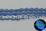 CLU141 15.5 inches 10*14mm oval blue luminous stone beads