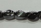 CMH151 15.5 inches 5*8mm twisted rice magnetic hematite beads