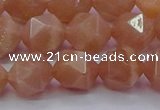 CMS1134 15.5 inches 12mm faceted nuggets peach moonstone beads