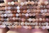 CMS1890 15.5 inches 5.5mm faceted round rainbow moonstone beads