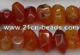 CNG1170 15.5 inches 8*14mm - 10*18mm faceted nuggets carnelian beads