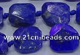 CNG5815 15.5 inches 10*12mm - 10*14mm faceted freeform lapis lazuli beads