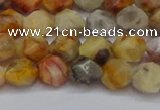 CNG6222 15.5 inches 6mm faceted nuggets yellow crazy lace agate beads