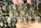 CNG7767 13*18mm - 15*25mm faceted freeform green garnet beads