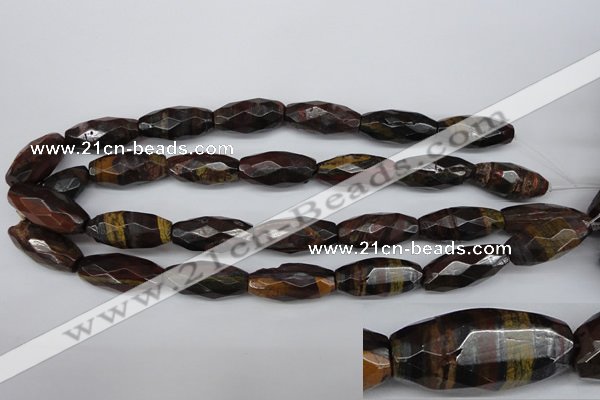 CNG883 15.5 inches 13*28mm faceted rice tiger iron nugget beads