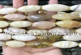 CRI143 15.5 inches 10*30mm faceted rice yellow opal gemstone beads