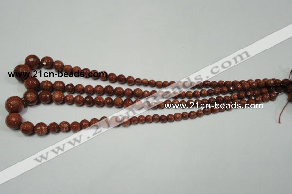 CRO736 15.5 inches 6mm – 14mm faceted round goldstone beads