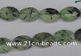 CRU188 15.5 inches 10*14mm faceted oval green rutilated quartz beads