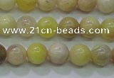 CSS600 15.5 inches 4mm round yellow sunstone gemstone beads