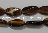 CTE1098 15.5 inches 10*20mm twisted & faceted oval yellow tiger eye beads