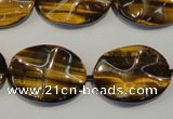 CTE832 15.5 inches 18*25mm wavy oval yellow tiger eye beads
