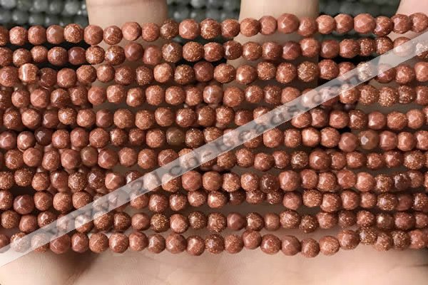 CTG3590 15.5 inches 4mm faceted round goldstone beads wholesale