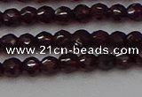 CTG555 15.5 inches 4mm faceted round tiny purple garnet beads