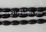 CTO116 15.5 inches 5*10mm faceted rice black tourmaline beads