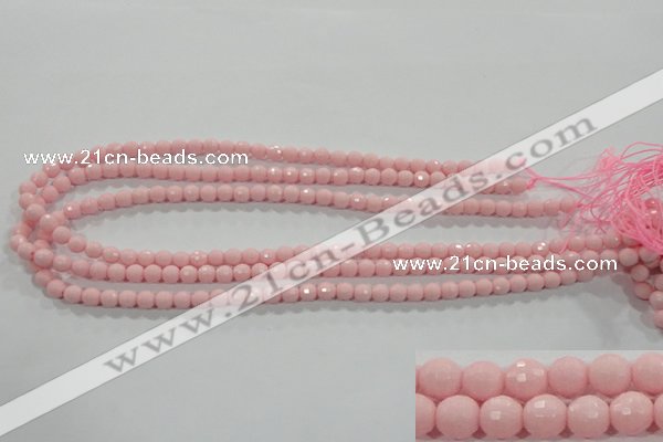 CTU1511 15.5 inches 4mm faceted round synthetic turquoise beads