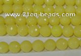 CTU2523 15.5 inches 4mm faceted round synthetic turquoise beads