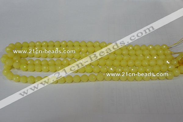 CTU2523 15.5 inches 4mm faceted round synthetic turquoise beads