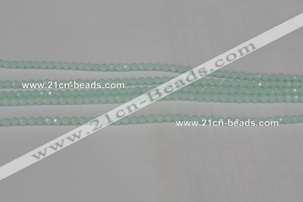 CTU2571 15.5 inches 4mm faceted round synthetic turquoise beads