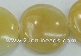 CYJ53 15.5 inches 35mm flat round yellow jade gemstone beads wholesale